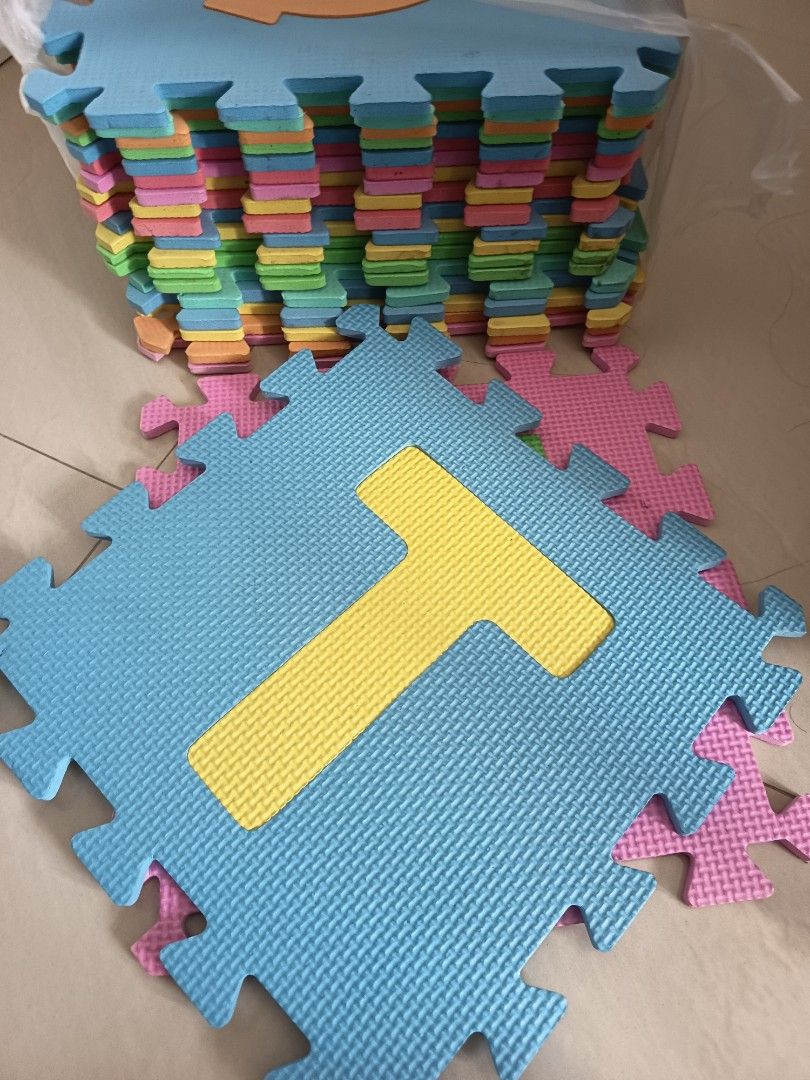 Alphabet Foam Puzzle Mat set (Category: Infant Playtime) located in Singapore. Submitted by lobang188 (Listing ID 1373782599, Image 2). Description: This is a foam puzzle mat with mamy letters colours. It's a great way to teach your little ones the alphabet while they play. The mat is made of soft, durable foam and is easy to clean. It's perfect for use in playrooms, nurseries, or any other area where kids play. The mat is in good condition and h