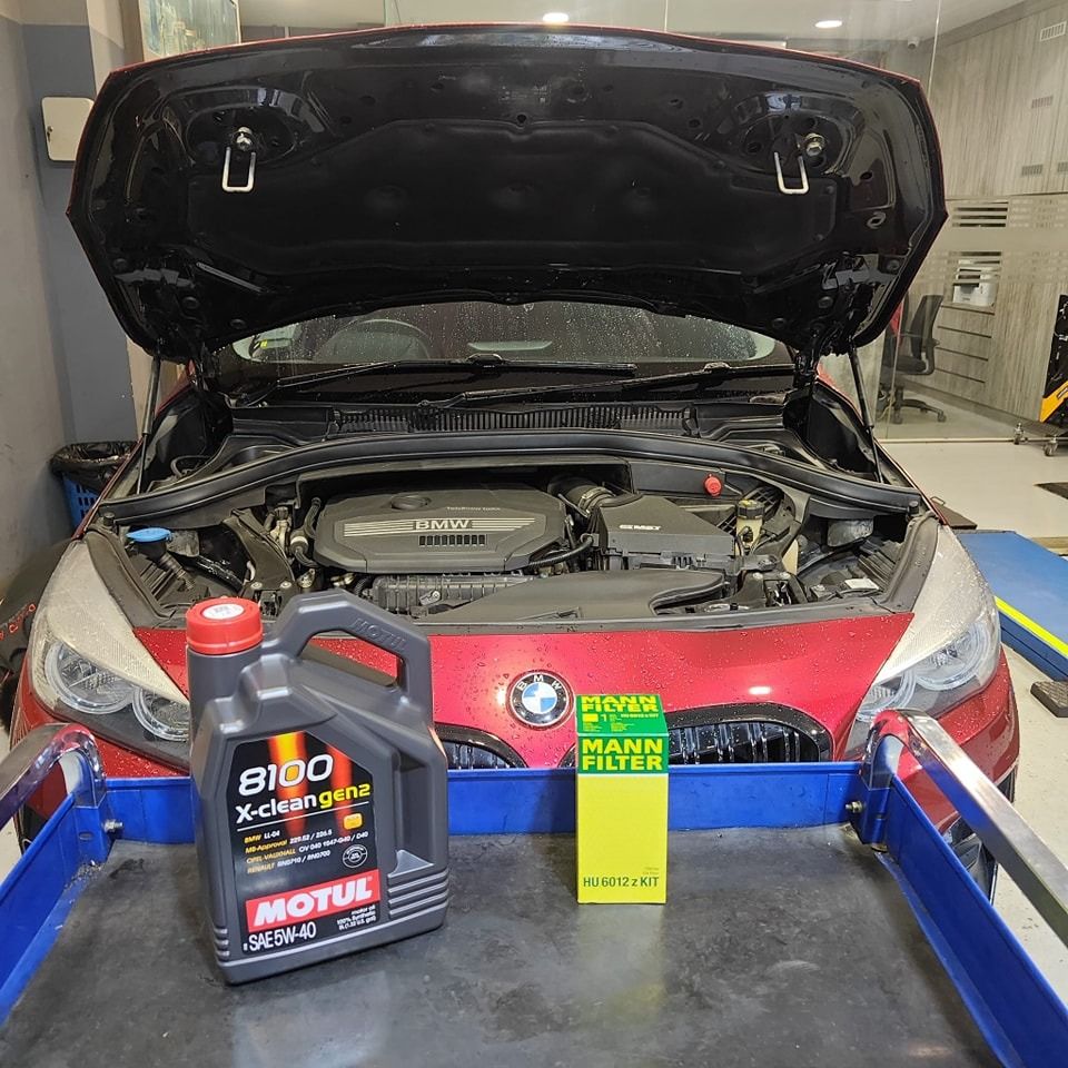 BMW F46 216i Servicing Using Motul X-Clean 8100 5W40 Engine Oil With Oil Filter, Change Original Timing Cover, Change Original Engine Mounting, Gearbox Mounting, Change Rear Original Brake Pad, Brake Sensor & Do Gearbox Adaptation (Category: Car Workshops & Services) located in Singapore. Submitted by DautoAccess (Listing ID 1373799121, Image 1). Description: BMW F46 216i Servicing Using Motul X-Clean 8100 5W40 Engine Oil With Oil Filter, Change 