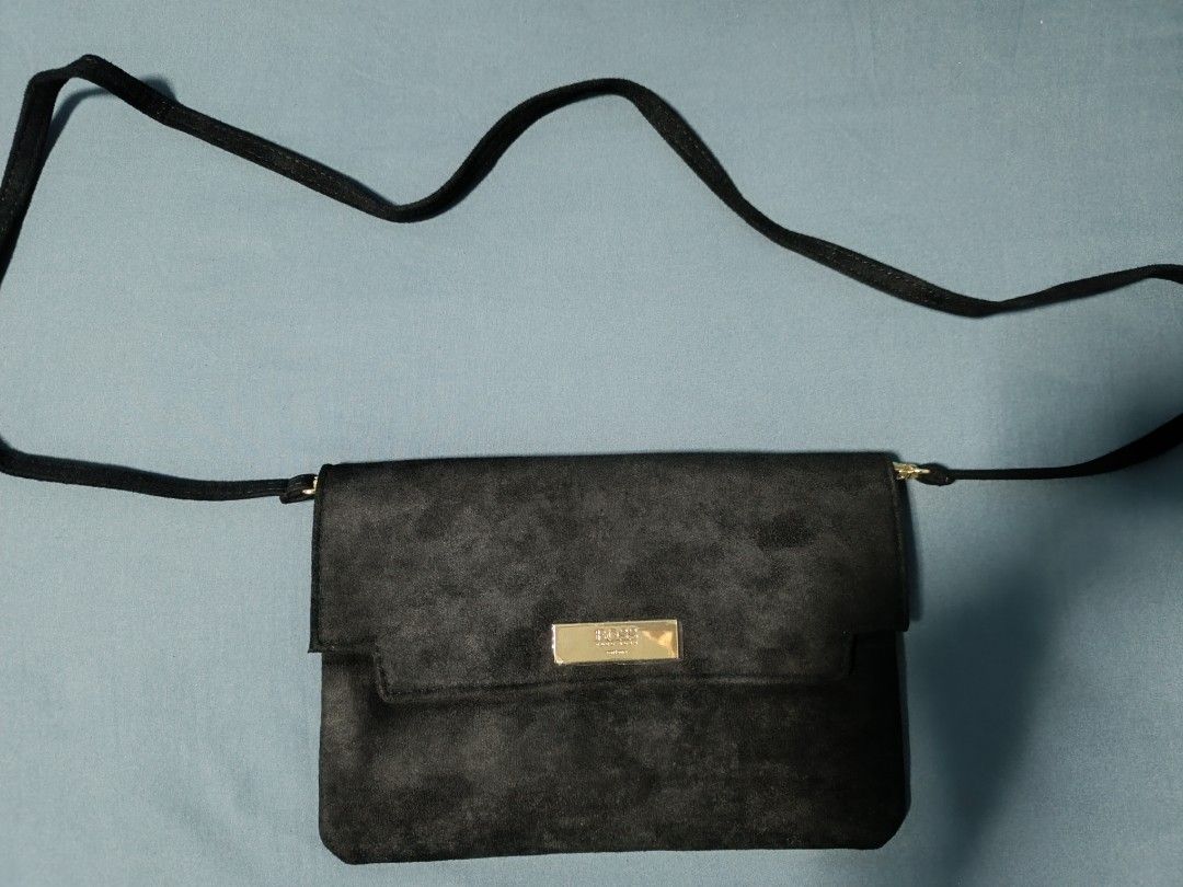 Boss GWP Ladies sling bag (Category: Bags & Wallets) located in Singapore. Submitted by jawdrop83 (Listing ID 1373897431, Image 1). Description: Brand New and unused item.