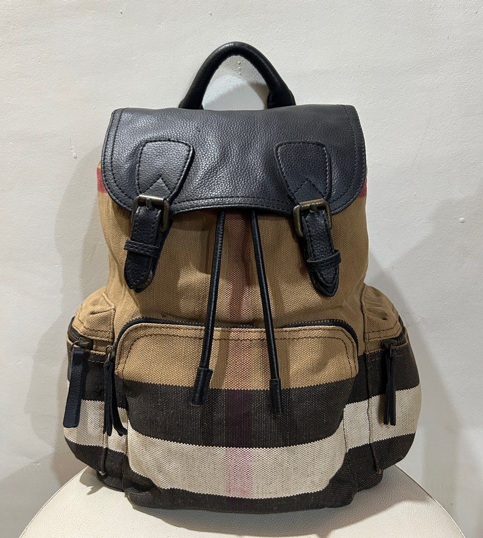 BURBERRY The Rucksack Heavy Canvas Backpack (Category: Luxury Bags & Wallets) located in Cagayan de Oro. Submitted by oracle_archives (Listing ID 1373916300, Image 1). Description: Vintage BURBERRY The Rucksack Heavy Canvas Backpack Distressing, rust on hardware sign of usage overall rate 8/10.