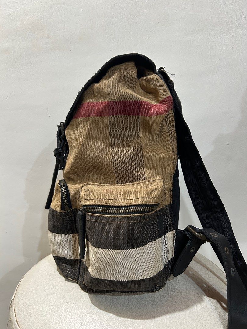 BURBERRY The Rucksack Heavy Canvas Backpack (Category: Luxury Bags & Wallets) located in Cagayan de Oro. Submitted by oracle_archives (Listing ID 1373916300, Image 3). Description: Vintage BURBERRY The Rucksack Heavy Canvas Backpack Distressing, rust on hardware sign of usage overall rate 8/10.