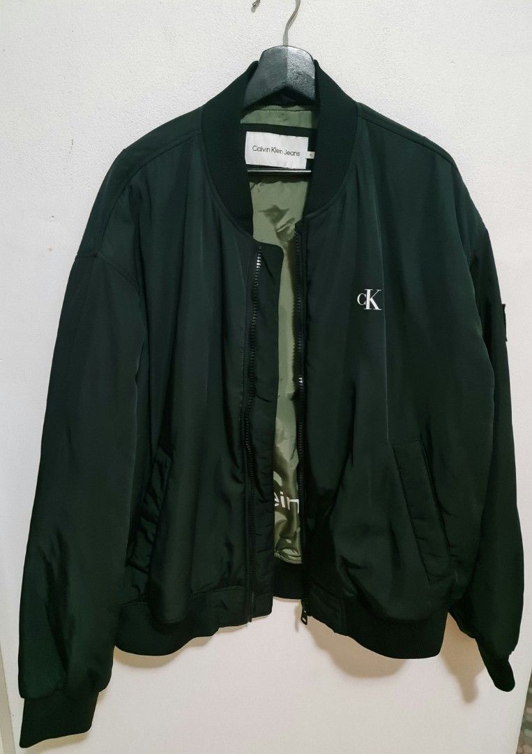 Calvin Klein Black Bomber Jacket(Size XL) (Category: Men's Clothes) located in Sydney. Submitted by desirably (Listing ID 1373878391, Image 1). Description: Near new Calvin Klein black bomber jacket(Size XL) for $90. Only tried on once&in excellent condition. Such a warm and classic jacket for colder months! Pick up from Marrickville. Pls feel free to check out my other listings..