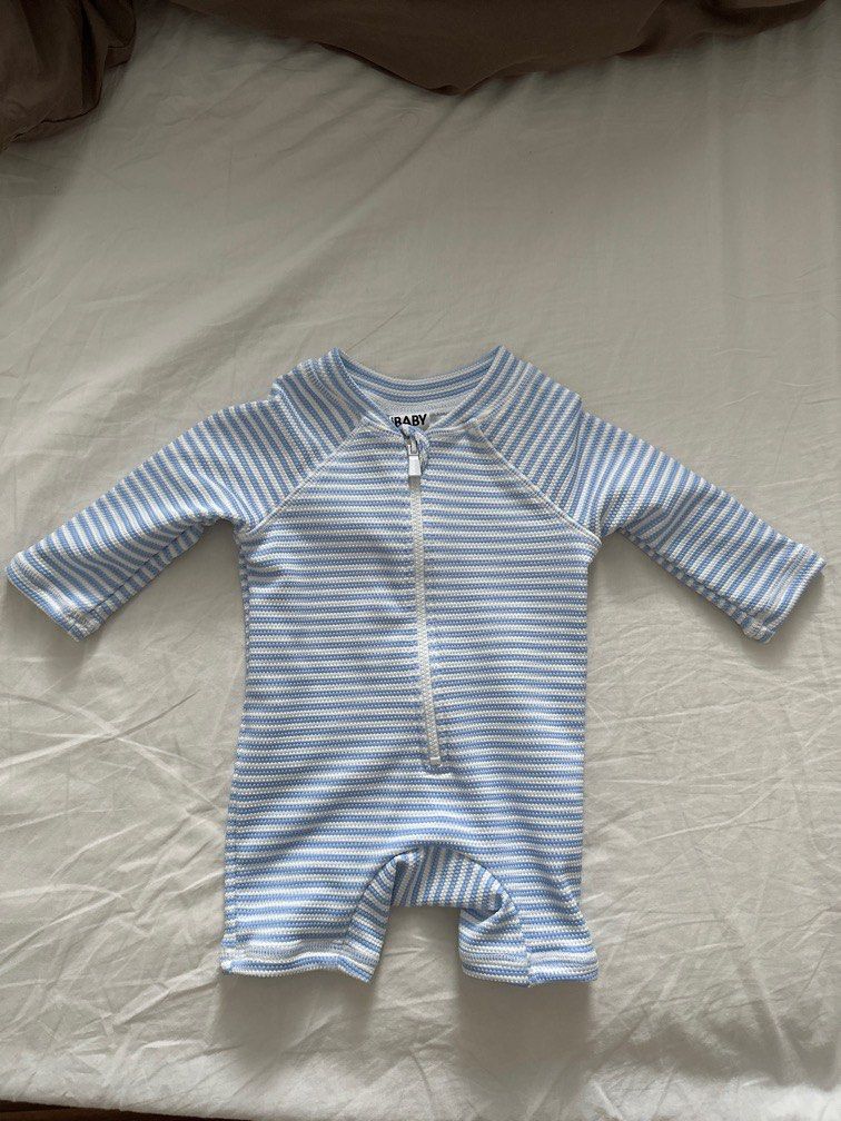 Cotton On swimsuit (Category: Babies & Kids Fashion) located in Singapore. Submitted by line0312 (Listing ID 1373793075, Image 1). Description: .