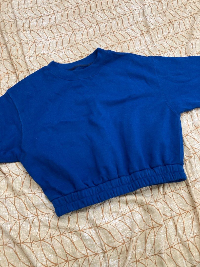 DARK ROYAL BLUE CROPPED TOP WITH GARTER (Category: Blouses) located in Manila. Submitted by vxnclodeclutters (Listing ID 1373933957, Image 1). Description: brandnew but no tags never used naka tambak lang tela sa loob is like a pullover/hoodie medyo mabulak abercrombie tatak small on tag but fits up to large.