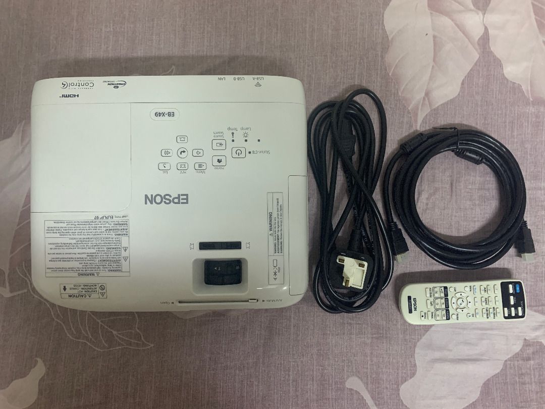 Epson EB-X49 Projector - Lightly used w/ remote (Category: Projectors) located in Taytay. Submitted by ana.ana4 (Listing ID 1373866986, Image 3). Description: The Epson EB-X49 is an XGA projector with a native resolution of 1024 x 768 and a brightness of 3600 lumens. It utilizes 3LCD technology, ensuring vibrant and accurate color reproduction. The projector includes key features such as HDMI connectivity and optional wireless capabilities, makin