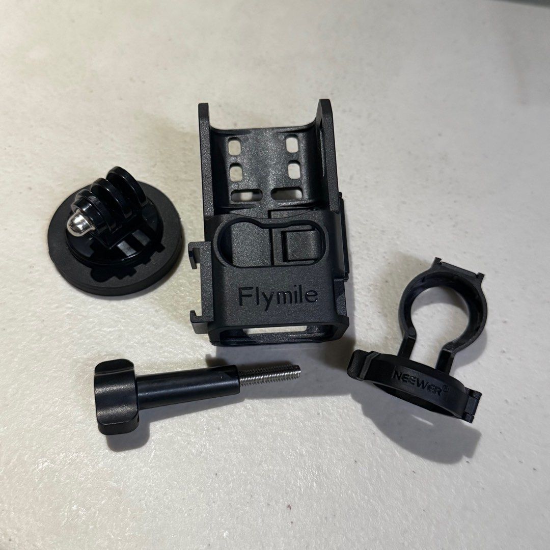 Flymile Adapter Mount Stand for DJI Osmo Pocket 3 (Category: Camera Bags & Carriers) located in Manila. Submitted by declutterwithelle (Listing ID 1373843309, Image 2). Description: Flymile Adapter Mount Stand for DJI Osmo Pocket 3 (Accessories) - expansion bracket with cold shoe interface - magnetic bottom plate silicone soft pad - short bend bracket - t-shaped screw - opened, but brand new (not used) - with free neewer magnetic top mount for ma