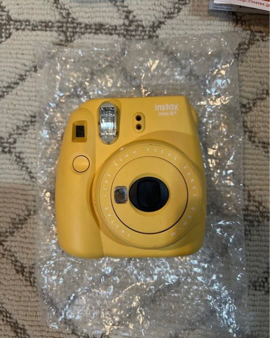 Fujifilm Instax Mini 8+ Yellow (Category: Cameras) located in San Juan City. Submitted by ccloset.cleanup (Listing ID 1373826550, Image 2). Description: -Pre-loved but in semi mint condition -Minor scratches/rubs. No defects. INCLUSIONS: -Original Box, Manual, and Strap -1 Instant Film (Expired - 11/2020) 🛵Mode of Delivery: Only Lalamove, Grab, or Angkas *Booking & Shipping fees, shouldered by the Buyer* 💰Mode of Payment: GCash or Bank Transfer