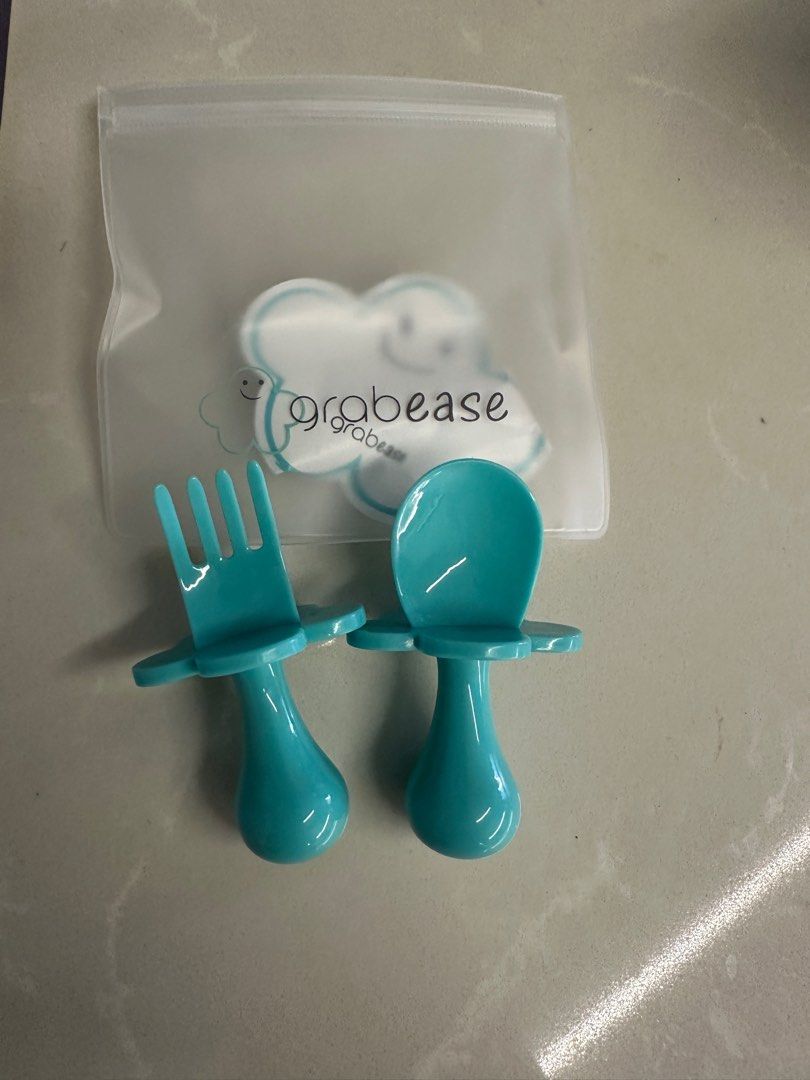 Grabease Self Feeding utensil (Category: Weaning & Toddler Feeding) located in Singapore. Submitted by nekopen (Listing ID 1373815669, Image 1). Description: Hardly used.