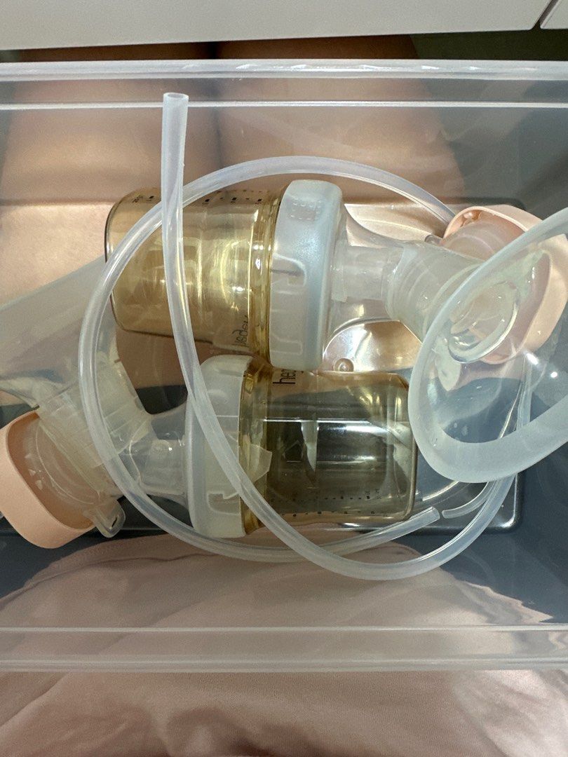 Hegen Electric Breast Pump with Accessories (Category: Breastfeeding & Bottle Feeding) located in Singapore. Submitted by minniee18 (Listing ID 1373822669, Image 2). Description: Selling a Hegen electric breast pump with all the accessories. The pump is in great condition and has been lightly used. It comes with the pump unit, bottles, tubing, and all the necessary parts. This is a great option for moms who are looking for a reliable and efficien