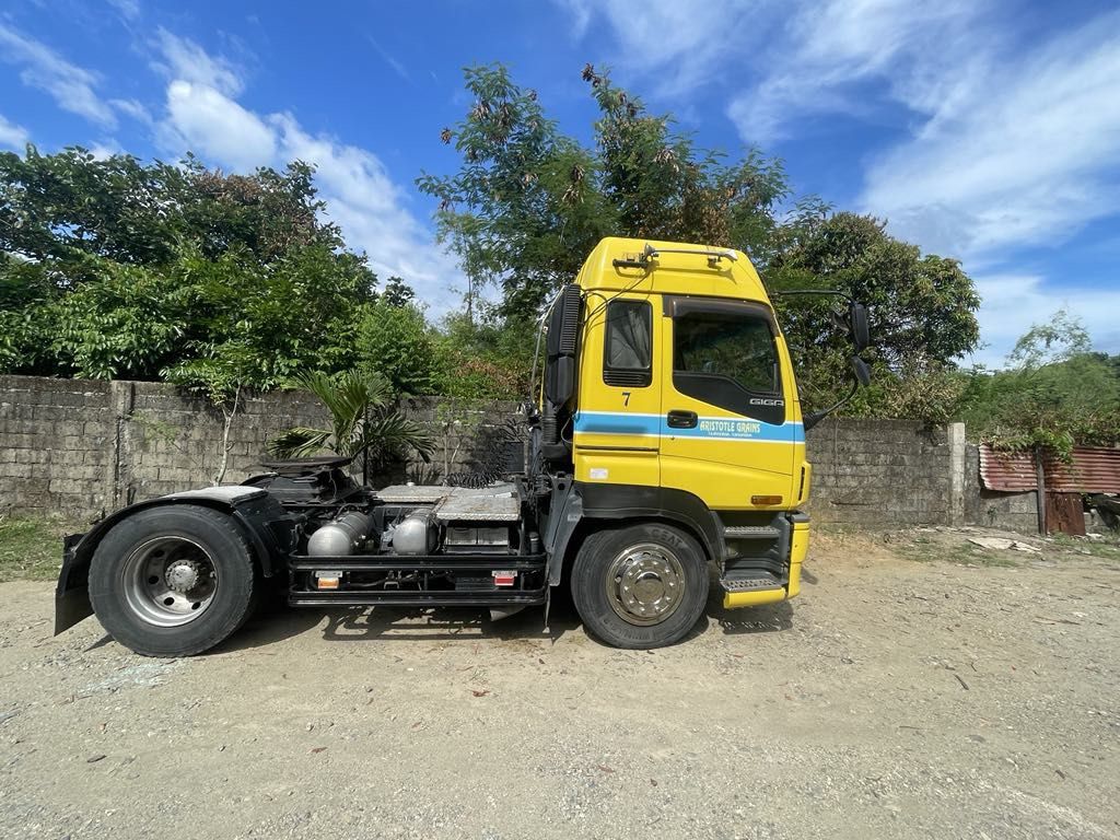 Isuzu Tractor Head with Trailer (Category: Heavy Vehicles) located in Taguig. Submitted by dmsjavier (Listing ID 1373774975, Image 2). Description: ‼️TRACTOR HEAD AND TRAILER SOLD AS SET ONLY‼️ 🔔UPDATE: Trailer was recently repainted to refresh appearance. 🔧UNIT DETAILS: ▪️With Aircon ▪️Engine: 6WG1 - inline ▪️Tractor Head: 6W High Roof ▪️Airbag Suspension - manually operated, more reliable than electronic ▪️Inline injection pump - less hassle 