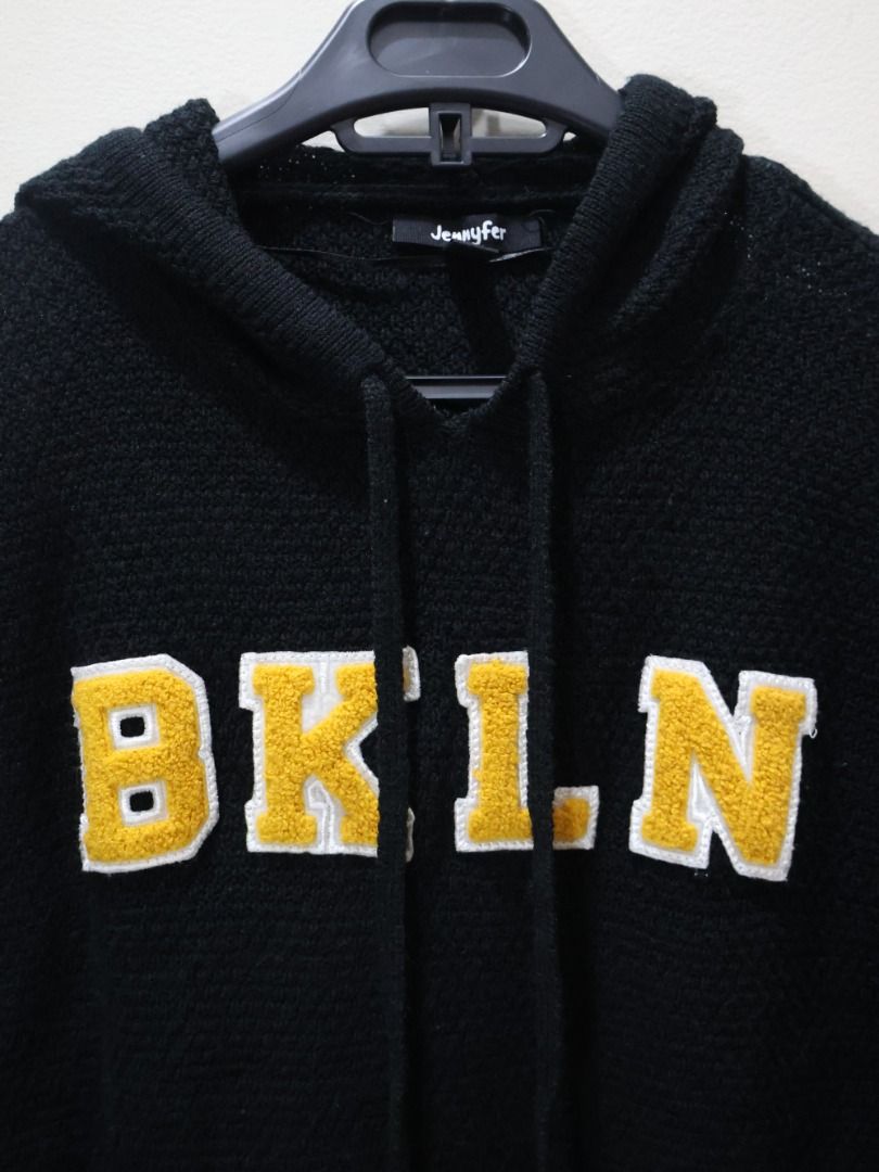 JENNYFER Black BKLYN Hoodie (Category: Coats, Jackets and Outerwear) located in Manila. Submitted by coldchai (Listing ID 1373830907, Image 2). Description: Brand: Jennyfer (Authentic) Color: Black with yellow & white fleece cotton letters Material: Soft fleece texture – warm and comfy. Great for layering during the -ber months or travel PM for more inquiries. Pay first then, pick-up and delivery!.