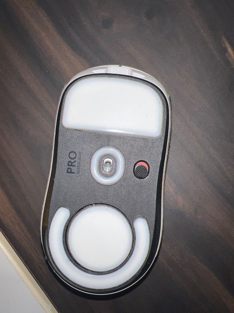 Logitech G Pro Superlight Wireless Gaming Mouse (Category: Mouse & Mousepads) located in Singapore. Submitted by joshuaxchee (Listing ID 1373850816, Image 3). Description: Logitech G Pro Superlight wireless gaming mouse for sale. Used for 3 years, includes grips and new mouse skates. Sensor issue requires more force to register light clicks. Comes with cable, no box. GENERATED BY AI .
