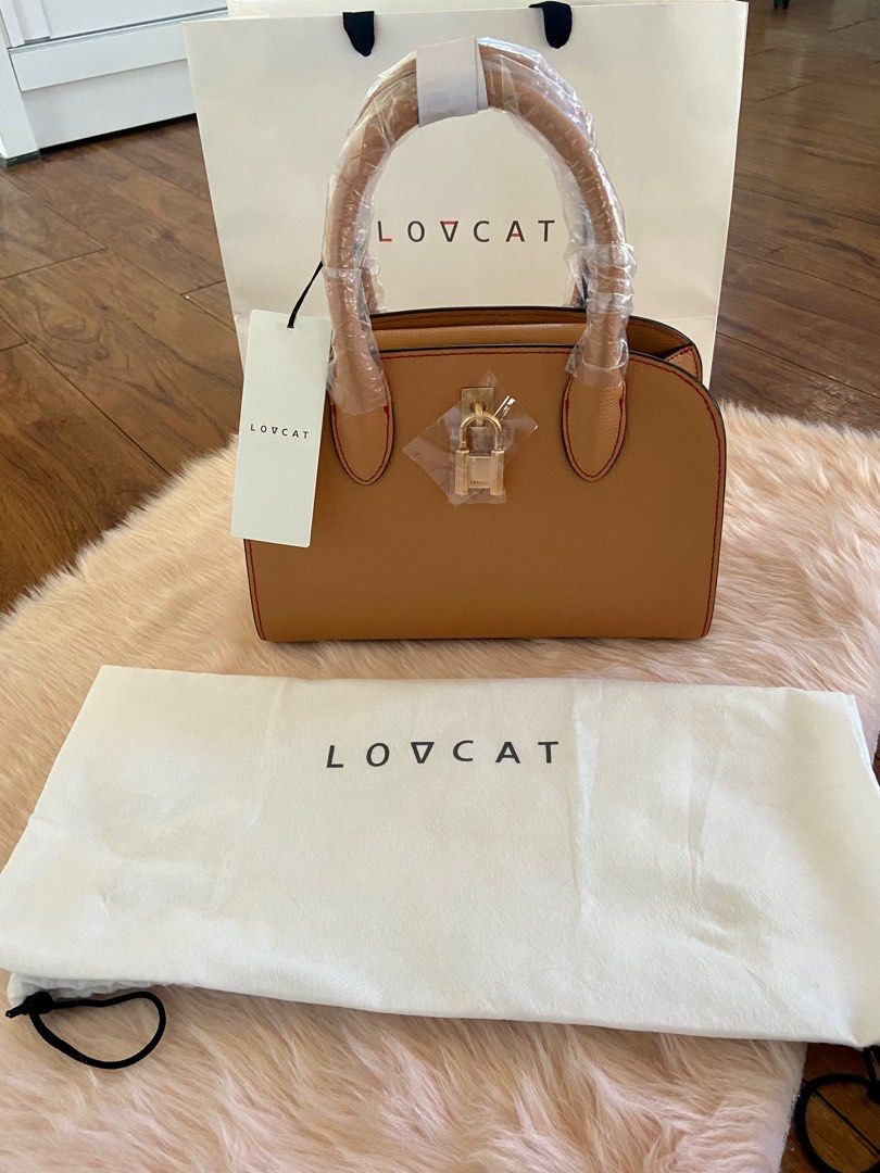 Lovcat 2 way bag (Category: Luxury Bags & Wallets) located in Calamba. Submitted by kate_25 (Listing ID 1373796890, Image 3). Description: 💯💯Original ✨Brandnew bought in Korea ❤️✨ ✅No issue ✅Clean ✨PM ME FOR MORE DETAILS.