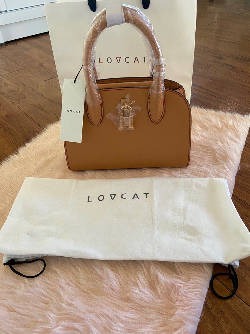 Lovcat 2 way bag (Category: Luxury Bags & Wallets) located in Calamba. Submitted by kate_25 (Listing ID 1373796890, Image 2). Description: 💯💯Original ✨Brandnew bought in Korea ❤️✨ ✅No issue ✅Clean ✨PM ME FOR MORE DETAILS.