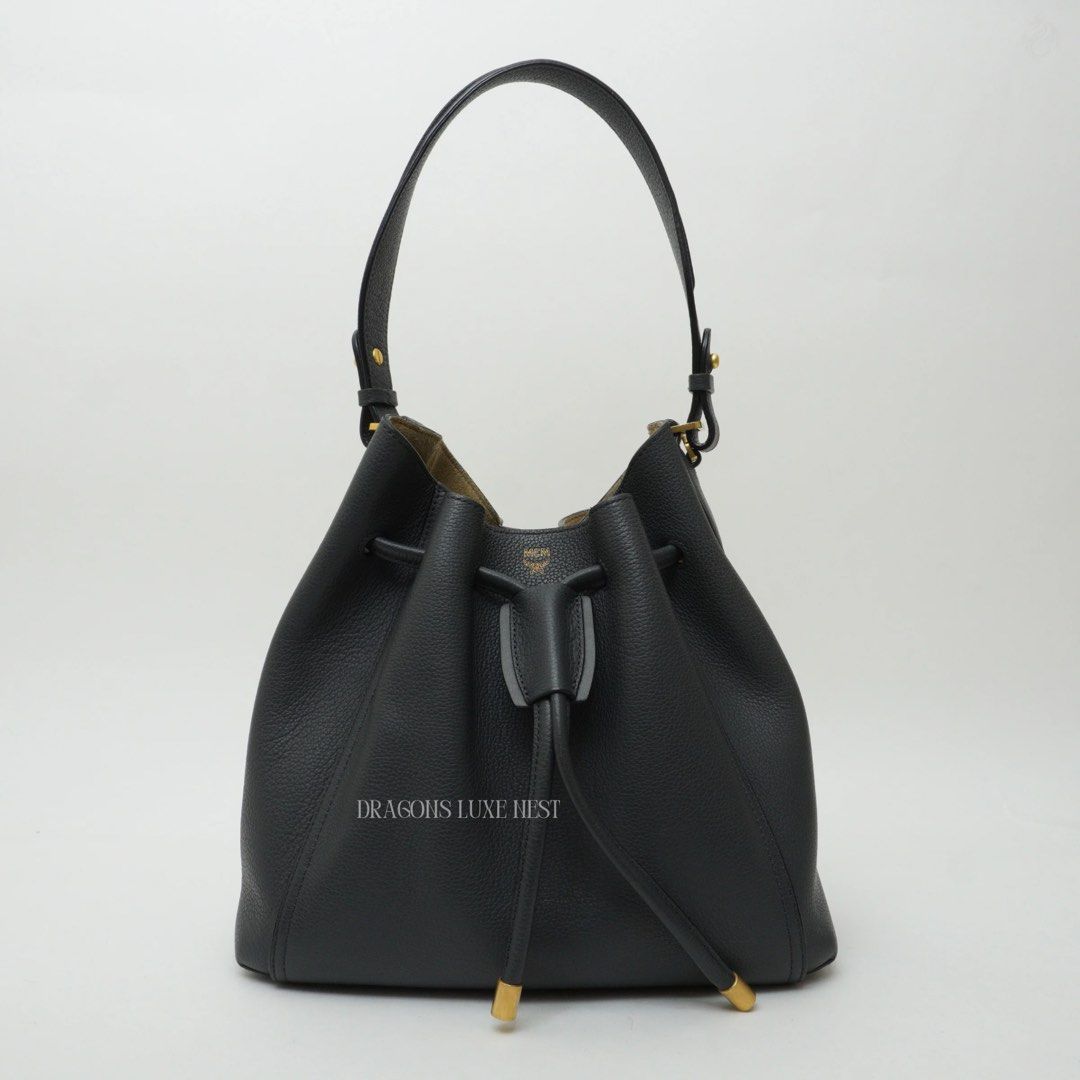 MCM Milla Drawstring Shoulder Bag (Category: Luxury Bags & Wallets) located in Taguig. Submitted by dluxenest (Listing ID 1373776416, Image 1). Description: Last price posted You may follow us on IG : dluxenest FB : Dragons Luxe Nest.