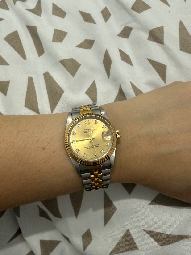 rolex datejust 31mm champagne gold (Category: Luxury Watches) located in Manila. Submitted by mariasells05 (Listing ID 1372778262, Image 1). Description: rolex 68273 datejust 31mm junior size two toned champagne dial diamond complete box papers tag 1992 good condition open for authentication meet up ok negotiable.