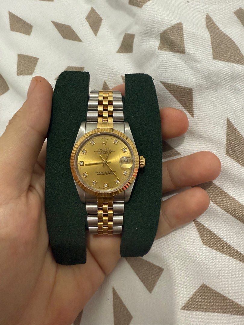 rolex datejust 31mm champagne gold (Category: Luxury Watches) located in Manila. Submitted by mariasells05 (Listing ID 1372778262, Image 2). Description: rolex 68273 datejust 31mm junior size two toned champagne dial diamond complete box papers tag 1992 good condition open for authentication meet up ok negotiable.