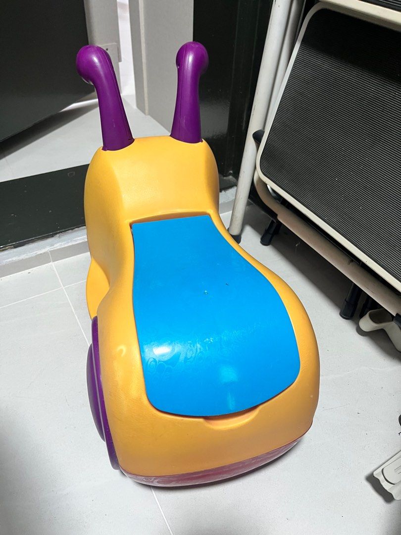 Snail Ride-on Wheels Toy (Category: Infant Playtime) located in Singapore. Submitted by dressywessy (Listing ID 1373874284, Image 3). Description: Much loved by kids but they’ve outgrown it With compartment under the seat Abt 43cm x 20cm .