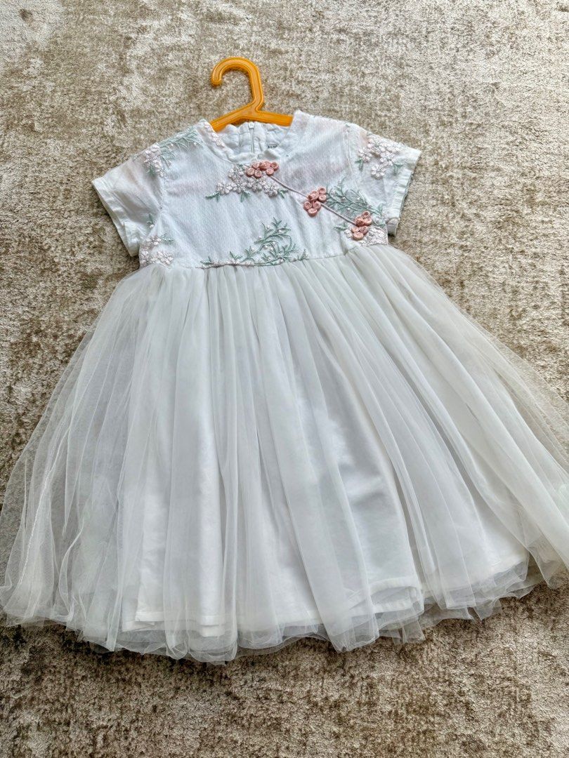 Super pretty cheong sam dress CNY Racial Harmony Day (Category: Babies & Kids Fashion) located in Singapore. Submitted by babypod (Listing ID 1373864692, Image 1). Description: Perfect condition only wore once. Pretty dress Size 7-8 years even 9 years also can wear. Height less than 130 can wear Sing post tracked mail + $2 Purchase $12 free normal mail .
