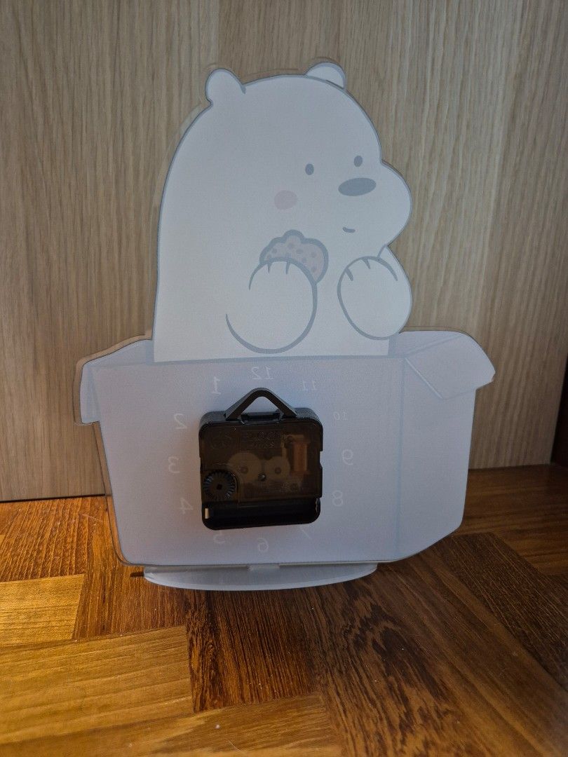 We Bare Bears Table Clock (Category: Clocks) located in Singapore. Submitted by dawgggggg (Listing ID 1373941813, Image 2). Description: dimensions: 20cm(L) by 25cm(H) numbers 10 and 11 seem smaller in size (see pic3) , not sure if its a defect or on purpose, but otherwise its all good for usage rfs: size is too small for my preference and i prefer wall clock.