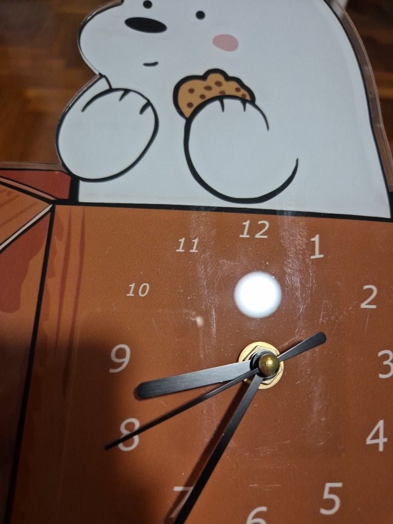 We Bare Bears Table Clock (Category: Clocks) located in Singapore. Submitted by dawgggggg (Listing ID 1373941813, Image 3). Description: dimensions: 20cm(L) by 25cm(H) numbers 10 and 11 seem smaller in size (see pic3) , not sure if its a defect or on purpose, but otherwise its all good for usage rfs: size is too small for my preference and i prefer wall clock.