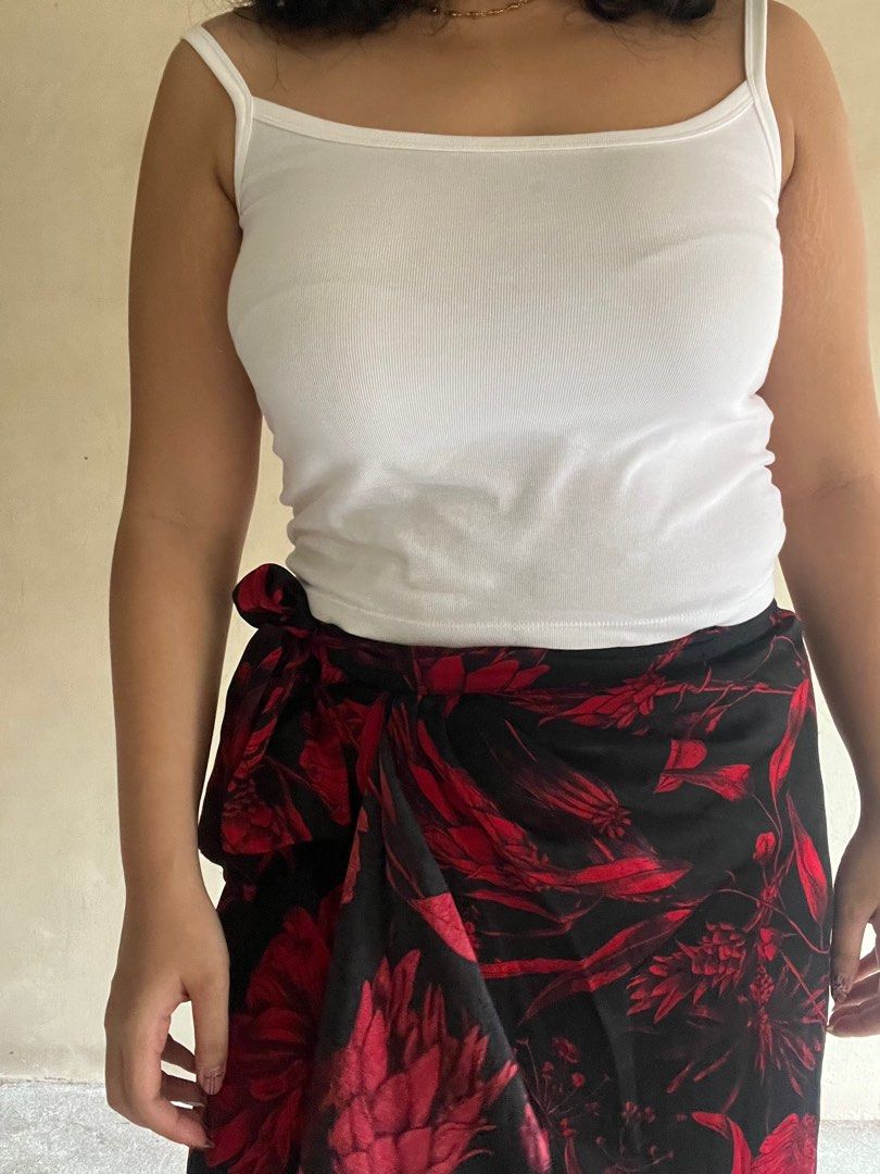 Zara Satin Floral Print Midi Skirt (Category: Skirts) located in Manila. Submitted by cees.pieces (Listing ID 1373842175, Image 2). Description: Has a slit on one leg and ties at the side, but has a zipper! Perfect for the summer or dressed up for dinner ♥️ Would better fit a frame a bit smaller than mine tbh! It's a bit tight on me Feel free to PM if you have questions 💌🫶🏼 Quality: 10/10, no flaws! ⭐️ Material: Satin Size: XS 🛵 Shipping shou
