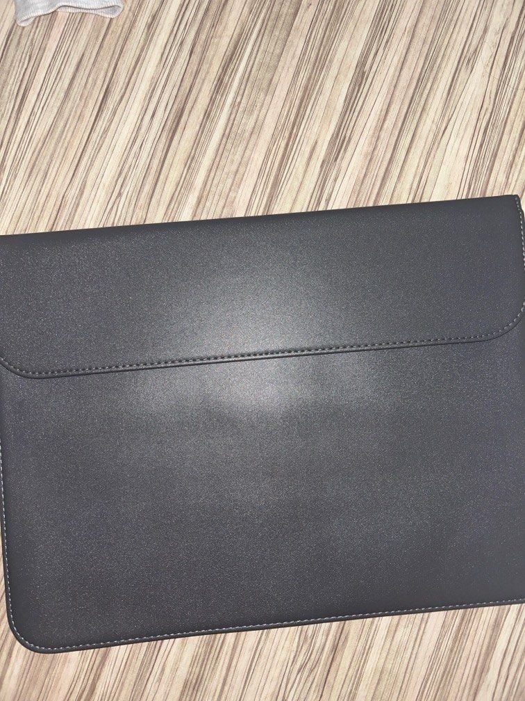 15 inch laptop leather sleeve grey (Category: Laptop Bags & Sleeves) located in Singapore. Submitted by coleetjn (Listing ID 1378049101, Image 1). Description: bought wrong size hence selling fast deals at 8.