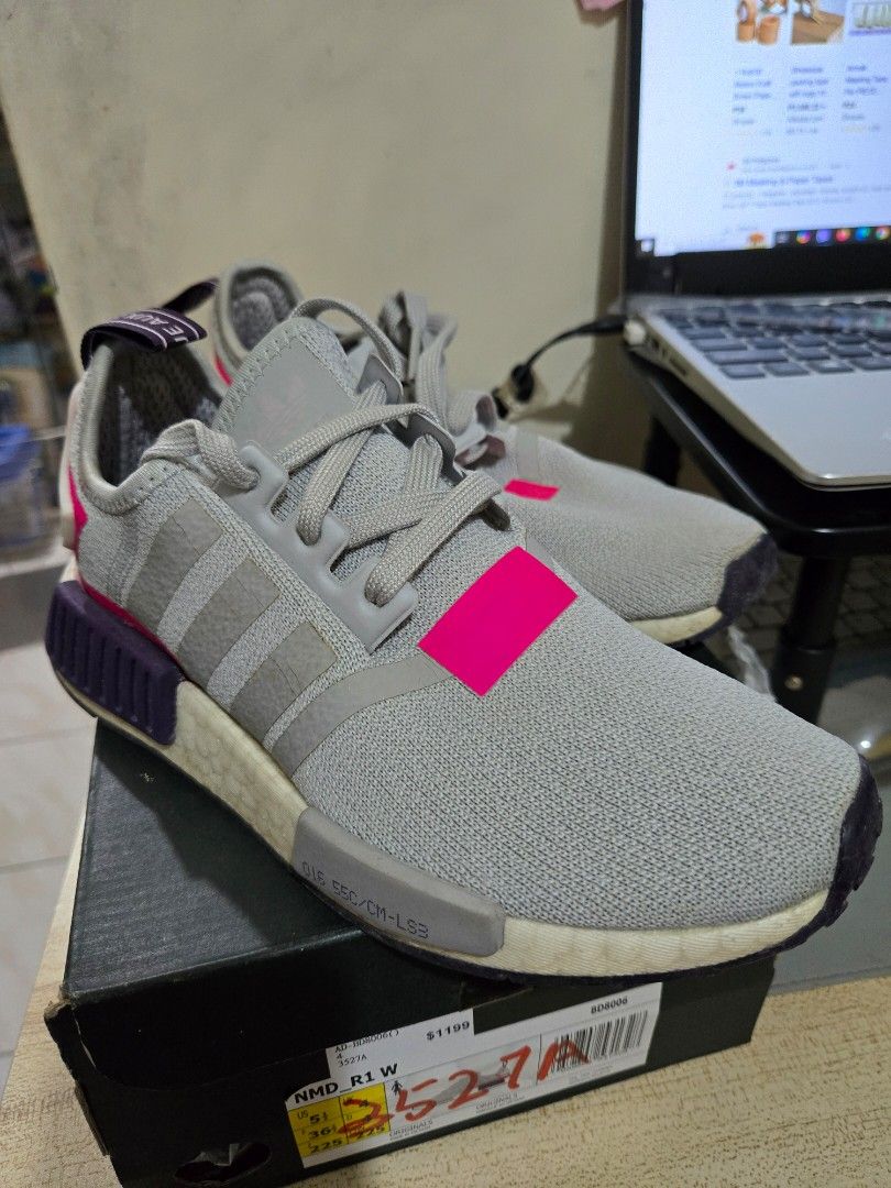 Adidas NMD R1 Womens US5.5 (Category: Sneakers) located in Quezon City. Submitted by karlleseshops (Listing ID 1378049749, Image 1). Description: ADIDAS WOMENS NMD R1 WOMENS orig. with box bought abroad for P9k. size 5.5 womens US / UK 4 Color: light gray with purple and hot link accents Used only 4x. stored for a long time. almost looks like new but looks stored for so long issue: expired glue. kayo na magpa glue. I can refer you sa gagawa na di