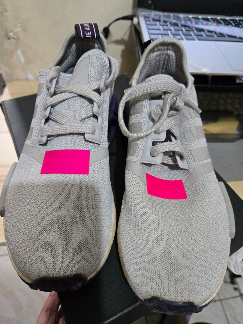 Adidas NMD R1 Womens US5.5 (Category: Sneakers) located in Quezon City. Submitted by karlleseshops (Listing ID 1378049749, Image 3). Description: ADIDAS WOMENS NMD R1 WOMENS orig. with box bought abroad for P9k. size 5.5 womens US / UK 4 Color: light gray with purple and hot link accents Used only 4x. stored for a long time. almost looks like new but looks stored for so long issue: expired glue. kayo na magpa glue. I can refer you sa gagawa na di