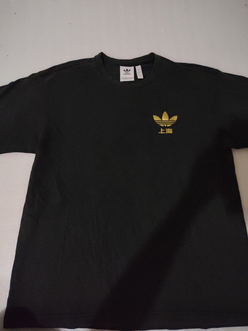 ADIDAS SHANGHAI TEE (Category: Tshirts & Polo Shirts ) located in Makati City. Submitted by nthy06 (Listing ID 1378098099, Image 1). Description: ADIDAS SHANGHAI TEE (21X27.5-28) SIZE M ON TAG 9/10 COLOR RATE NO ISSUE GOOD CONDITION.