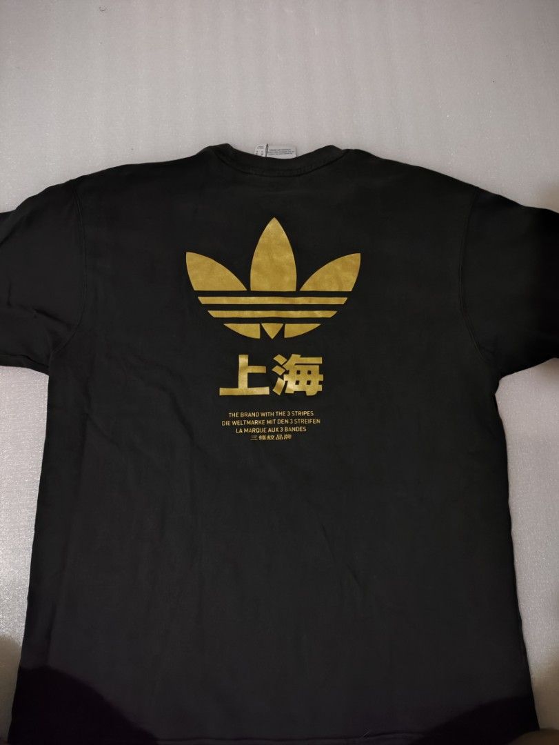 ADIDAS SHANGHAI TEE (Category: Tshirts & Polo Shirts ) located in Makati City. Submitted by nthy06 (Listing ID 1378098099, Image 2). Description: ADIDAS SHANGHAI TEE (21X27.5-28) SIZE M ON TAG 9/10 COLOR RATE NO ISSUE GOOD CONDITION.