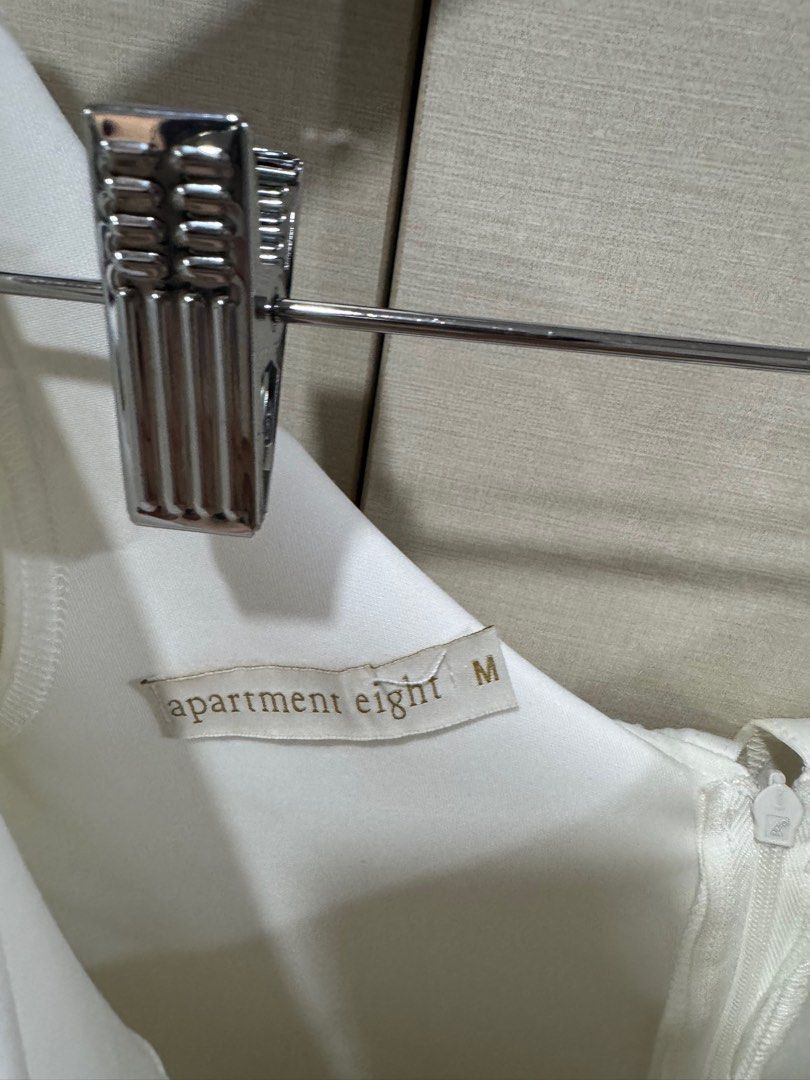 Apartment Eight White Off Shoulder Top (Medium) (Category: Blouses) located in Quezon City. Submitted by declutter_cts (Listing ID 1378083675, Image 3). Description: Neoprene cloth.