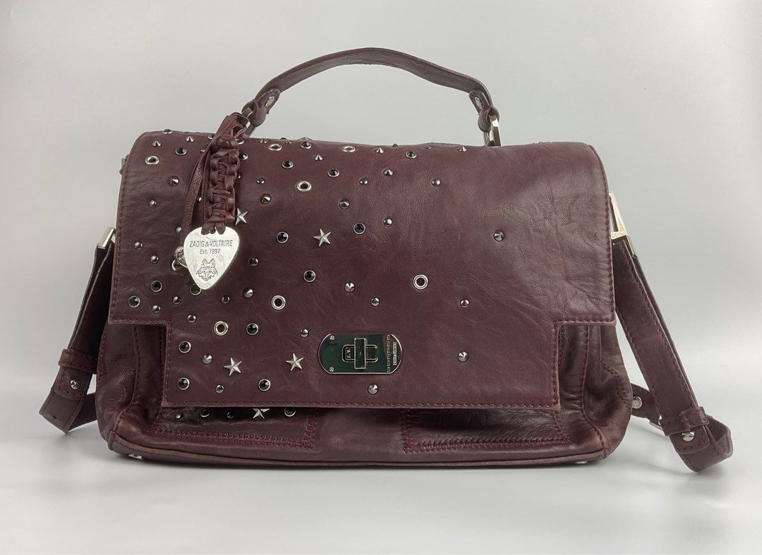 Auth Zadig & Voltaire bag (Category: Luxury Bags & Wallets) located in Caloocan City. Submitted by siftedthriftedph (Listing ID 1378010497, Image 1). Description: Auth Zadig & Voltaire vintage bag Limited edition, super unique 🫶🏻 Made of soft lamb leather signs of use na rubs pero soft to the touch with orig price tag of ₱37k+++ Z&V studs everywhere L-12in x H-9in.
