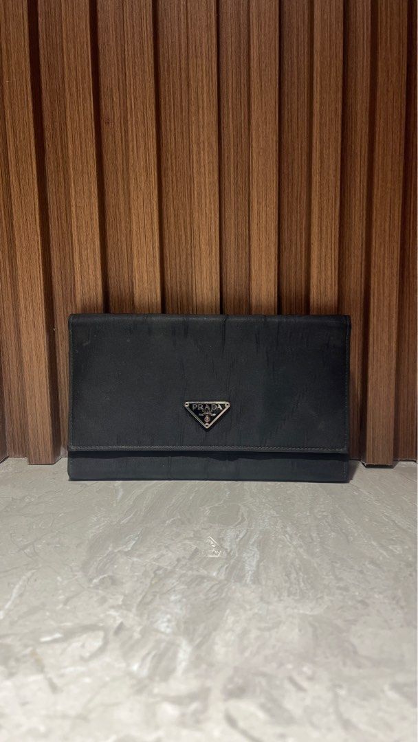 Authentic Prada Long Wallet (Category: Luxury Bags & Wallets) located in Trece Martires City. Submitted by imwelllovedvintage (Listing ID 1378026826, Image 1). Description: ❗️No return, no exchange unless proven fake by professional authenticators❗️ Please see original listing 🫶🏻 Check out ‘Authentic Prada Nylon Wallet’, available at PHP 1,600 on #Carousell https://carousell.app.link/QLzjAoTVDUb.