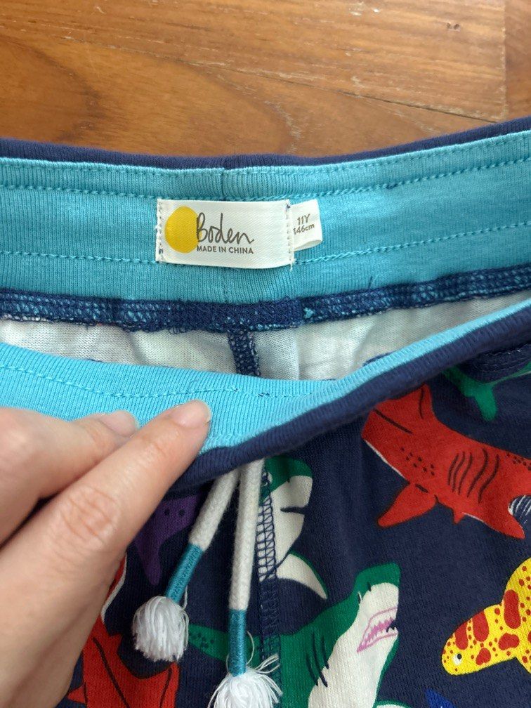BN Boden Shark Print Boys Shorts (11 years) (Category: Babies & Kids Fashion) located in Singapore. Submitted by _pinkdragonfly (Listing ID 1378043416, Image 3). Description: Condition 10/10, washed never worn 100% cotton 100% authentic Size 11-12 years Waist before stretch 30cm Length 54cm Postage available.
