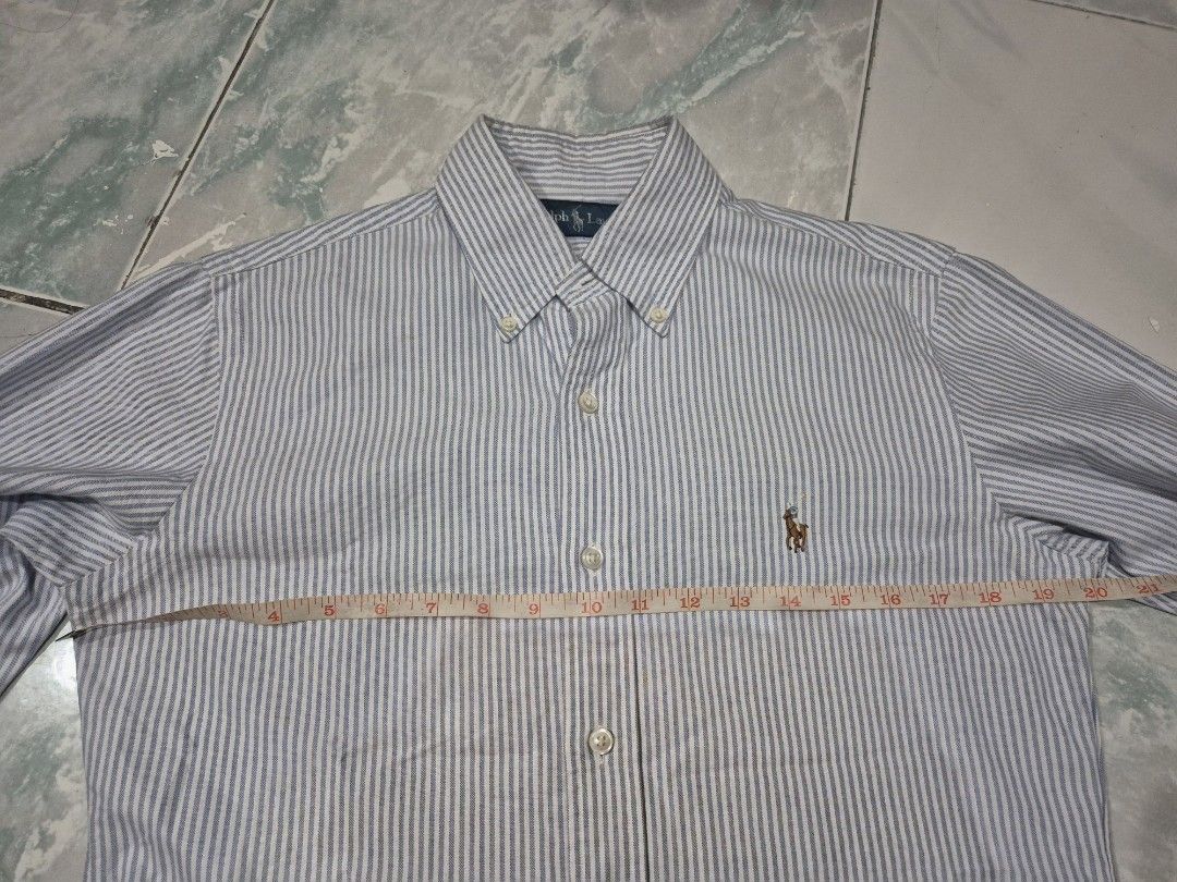 Button Down Ralph Lauren multi-colored pony (Category: Formal Shirts) located in Manila. Submitted by vanarse (Listing ID 1378045288, Image 2). Description: white color with blue stripes w 20 x l 30 with small unoticable stain 1,300+shipping fee.