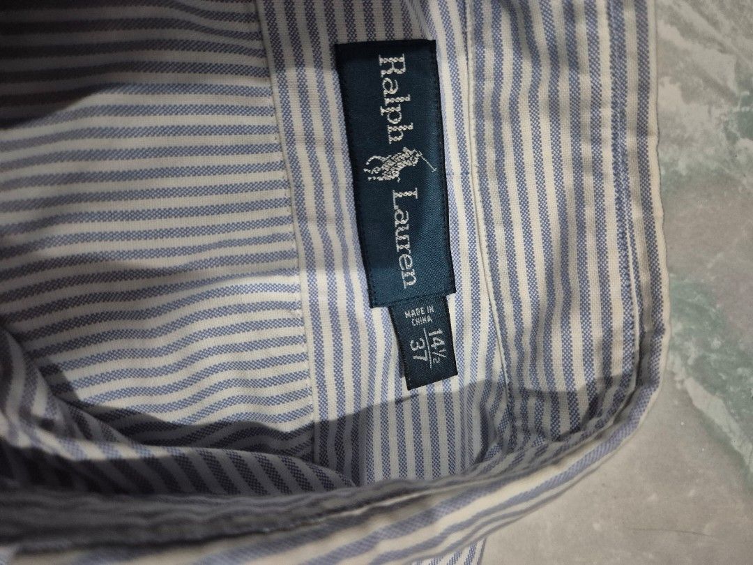 Button Down Ralph Lauren multi-colored pony (Category: Formal Shirts) located in Manila. Submitted by vanarse (Listing ID 1378045288, Image 3). Description: white color with blue stripes w 20 x l 30 with small unoticable stain 1,300+shipping fee.