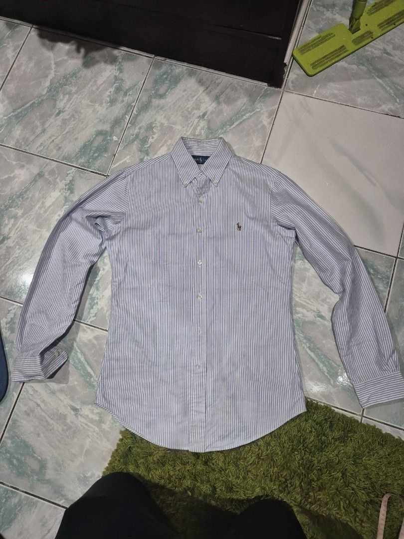 Button Down Ralph Lauren multi-colored pony (Category: Formal Shirts) located in Manila. Submitted by vanarse (Listing ID 1378045288, Image 1). Description: white color with blue stripes w 20 x l 30 with small unoticable stain 1,300+shipping fee.