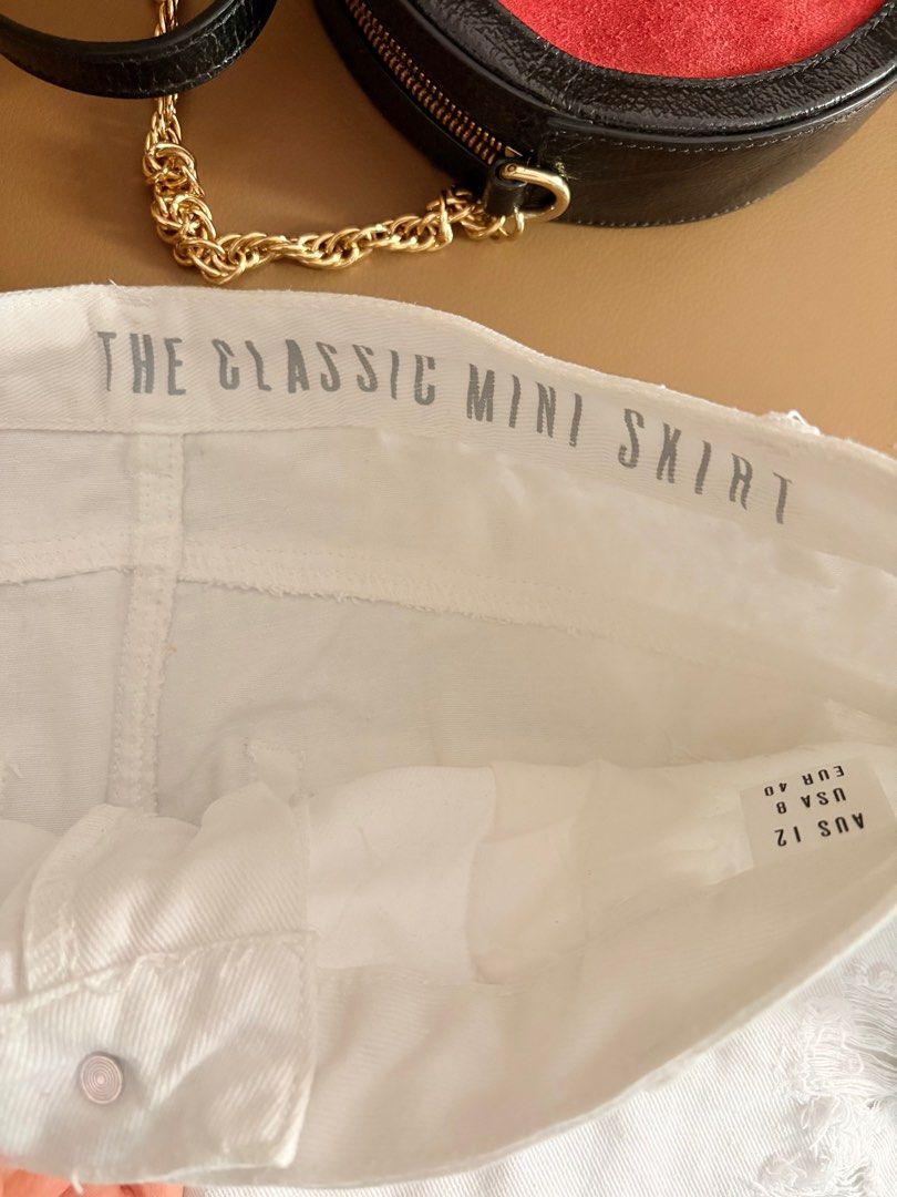 COTTON ON CLASSIC TATTERED MINISKIRT (Category: Skirts) located in Davao. Submitted by flamingopark (Listing ID 1377968712, Image 3). Description: Bought this for 2K plus in the MALL. NEVER WORN. NOT UKAY. TATTERED. No issue. SIZE LARGE. Very nice item✅ RFS; Decluttering season🙏.