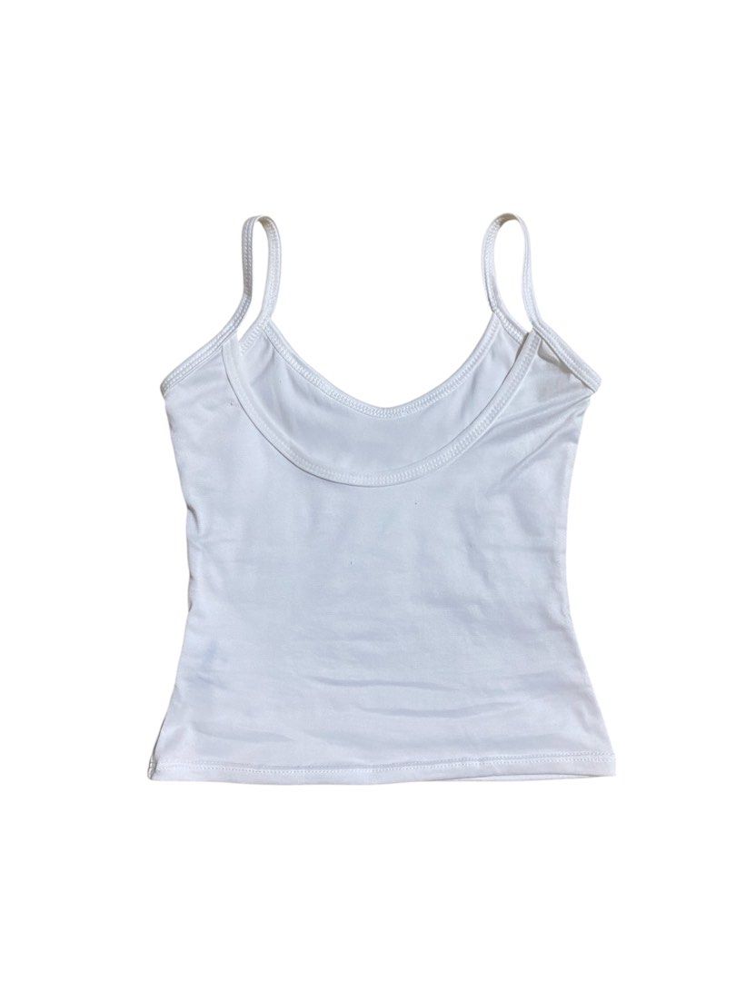 FREE SF | White Low Back Tank Top (Category: Sleeveless) located in Manila. Submitted by j_decluttering (Listing ID 1378108016, Image 2). Description: - free sf via jnt - thick stretchy fabric, not see through at all - very flattering - fits up to S only - good staple, back isnt too low, sakto lang.