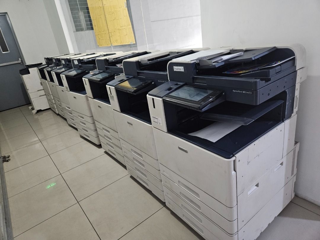 Fuji Xerox Color Printers (Category: Printers, Scanners & Copiers) located in Malabon City. Submitted by behind.boxes (Listing ID 1377949278, Image 1). Description: The Fuji Xerox ApeosPort C33XX is a multifunction printer (MFP) that offers copy, print, and scan functionalities, with optional fax capabilities. It's designed for A3 paper format and uses laser technology for color printing. Key features include a color LCD touch screen interface, w