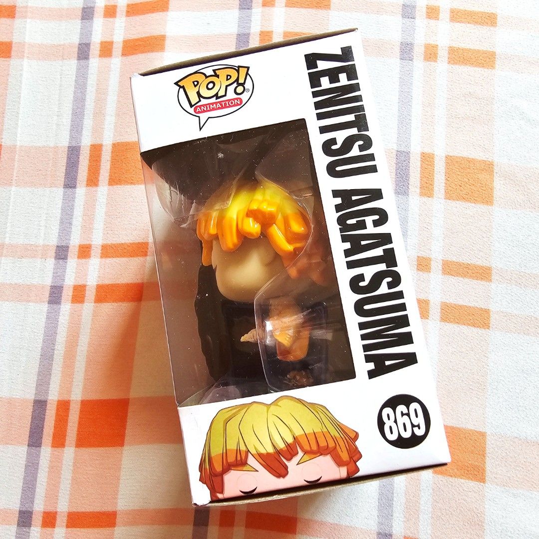 Funko Pop Demon Slayer Zenitsu Figure (Category: Designer & Blind Box Toys) located in Bacoor. Submitted by 3fties.ph (Listing ID 1377975886, Image 2). Description: DISCLAIMER: Bootleg/ Knockoff Figure Box has some dents on the back Never been used or displayed What you see is what you get.