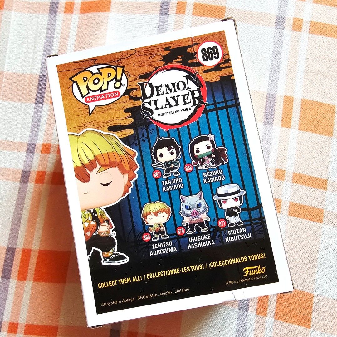 Funko Pop Demon Slayer Zenitsu Figure (Category: Designer & Blind Box Toys) located in Bacoor. Submitted by 3fties.ph (Listing ID 1377975886, Image 3). Description: DISCLAIMER: Bootleg/ Knockoff Figure Box has some dents on the back Never been used or displayed What you see is what you get.
