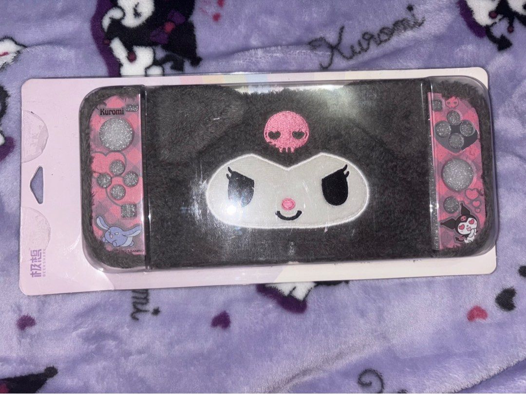 Kuromi Geekshare Nintendo Switch OLED Plush Case (Category: Nintendo) located in Manila. Submitted by zhiejou (Listing ID 1378138748, Image 2). Description: With flaw sa left joycon cover ( check photos ) everything else in great condition. With stand din siya. FOR NINTENDO SWITCH OLED MODEL ONLY Loc: San Mateo, Rizal MOD: Lalamove sdd, J&T express Meet up: SM San Mateo.