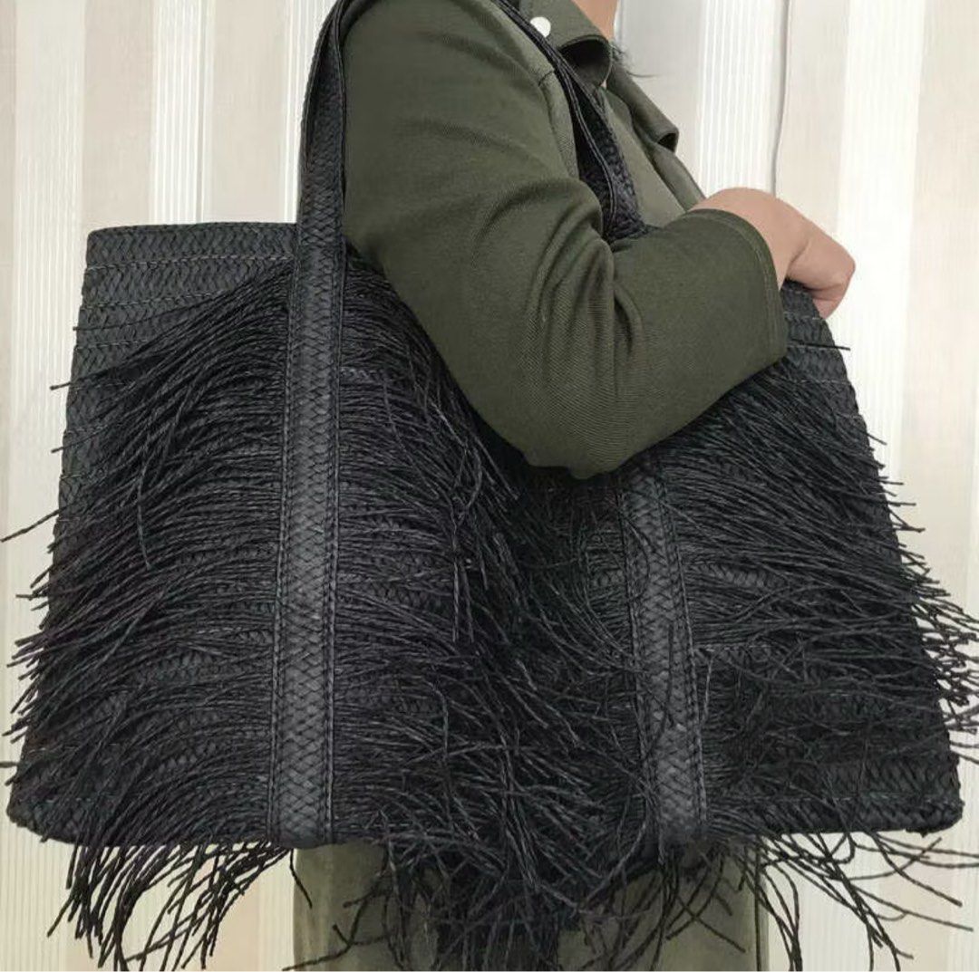 Large Fringe Raffia Beach Bag (Category: Tote Bags) located in Iloilo. Submitted by randomoddling (Listing ID 1378040171, Image 3). Description: Dimensions: Width: 45cm (17”) Height: 33cm (12.99”) Base: 19cm (7.48”) Strap Drop: 15cm (9.9”) Available in 2 colors: Khaki and Black Pre-Order: ETA 2 weeks.