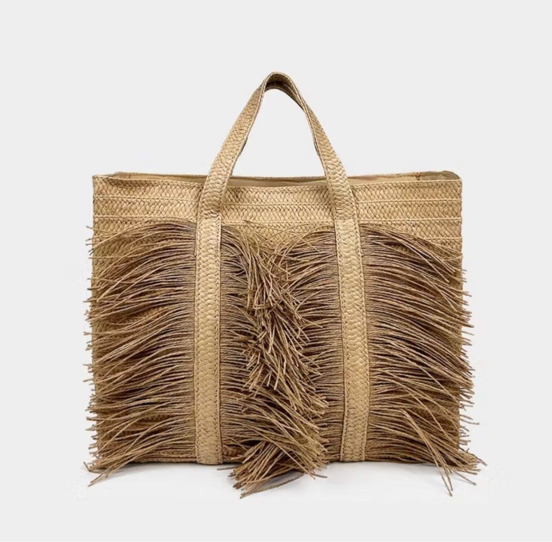 Large Fringe Raffia Beach Bag (Category: Tote Bags) located in Iloilo. Submitted by randomoddling (Listing ID 1378040171, Image 2). Description: Dimensions: Width: 45cm (17”) Height: 33cm (12.99”) Base: 19cm (7.48”) Strap Drop: 15cm (9.9”) Available in 2 colors: Khaki and Black Pre-Order: ETA 2 weeks.