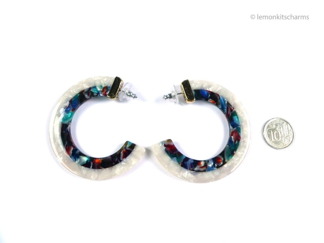 Large White Rainbow C-hoop Pierced Earrings, er2662-ci (Category: Earrings) located in Singapore. Submitted by lemonkitscharms (Listing ID 1378078001, Image 3). Description: Large White & Rainbow C-hoop Earrings, for pierced ears. Clutches are new. I think these are modern. The plastic parts are in good condition. The top caps have wear on the plating (see pics), the dot there is a clear rhinestone. Hoops are shimmery white and tortoise-like styl