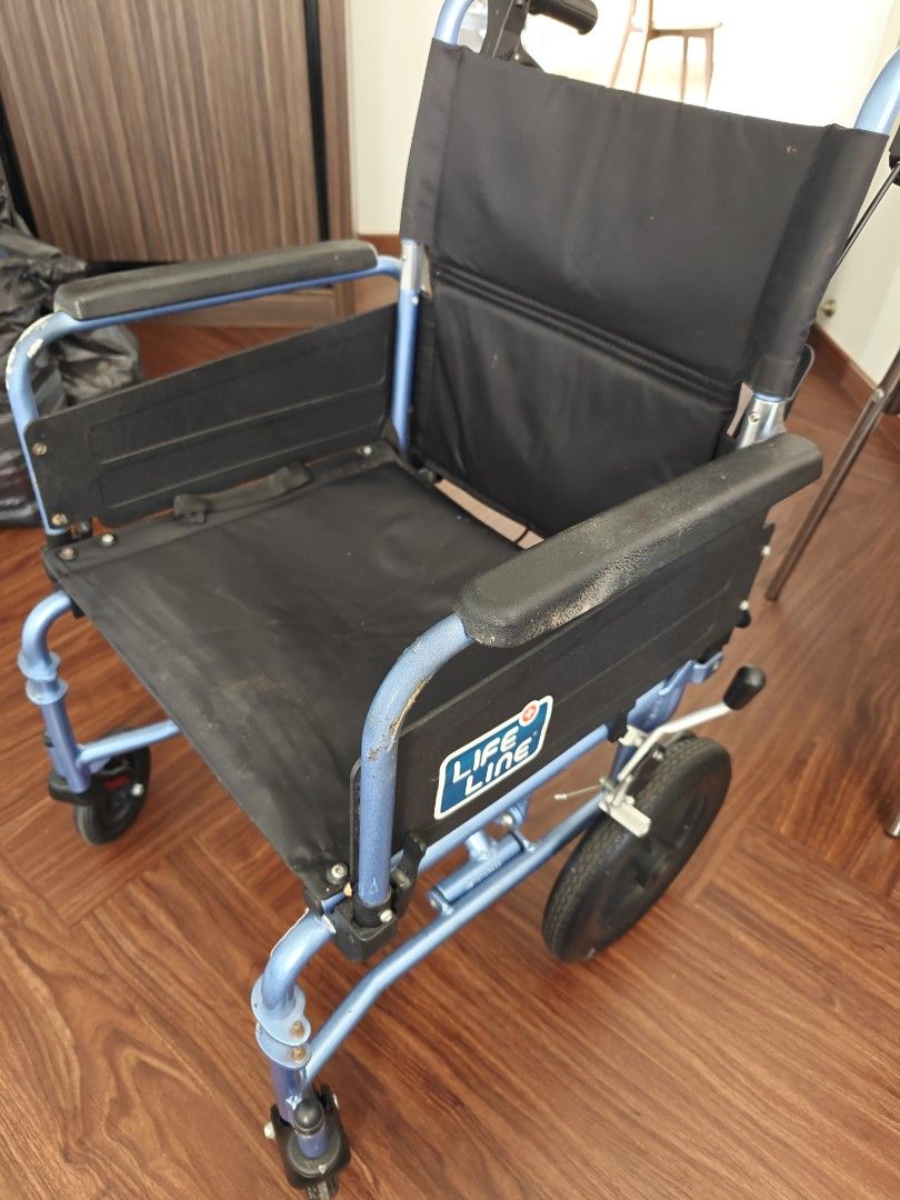 Life Line Wheelchair - Blue (Category: Wheelchairs) located in Singapore. Submitted by darkbane303 (Listing ID 1378021231, Image 1). Description: - Life Line wheelchair in good condition. - Sturdy blue frame. - Black seating. - Wheels in good working order. - Provides mobility assistance. - Please refer to photos for details..