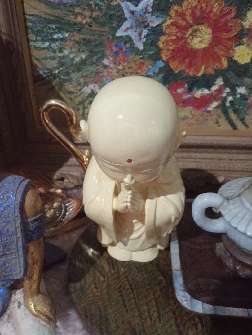 Vegetable ivory Lucky monk buddha (Category: Religious Items) located in Batangas. Submitted by girlmeetspurple (Listing ID 1378049514, Image 2). Description: displaying a buddha often associated with good luck, prosperity, and happiness. These statues are believed to bring positive energy, ward off negative influences, and create a harmonious atmosphere. .