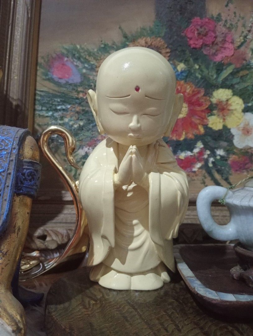 Vegetable ivory Lucky monk buddha (Category: Religious Items) located in Batangas. Submitted by girlmeetspurple (Listing ID 1378049514, Image 1). Description: displaying a buddha often associated with good luck, prosperity, and happiness. These statues are believed to bring positive energy, ward off negative influences, and create a harmonious atmosphere. .